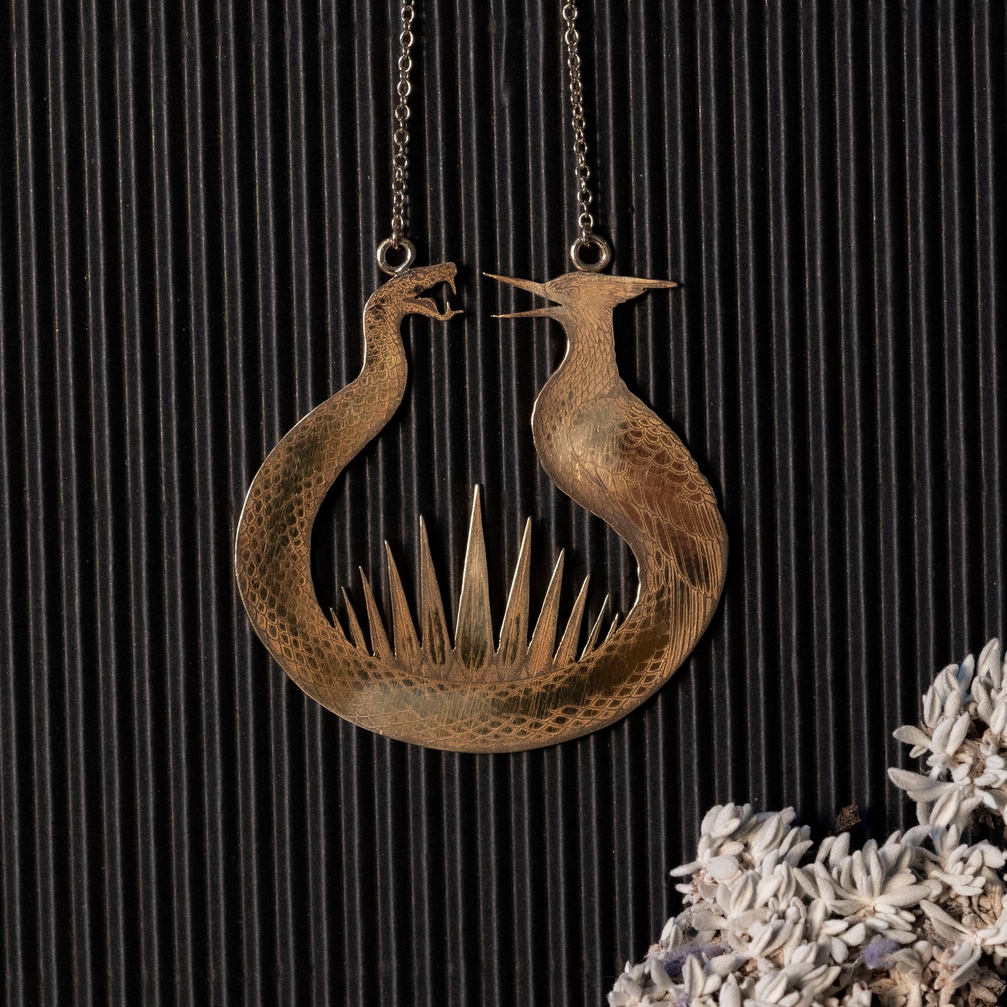 The Reaping the Sunrise inspired necklace on a gold plated chain