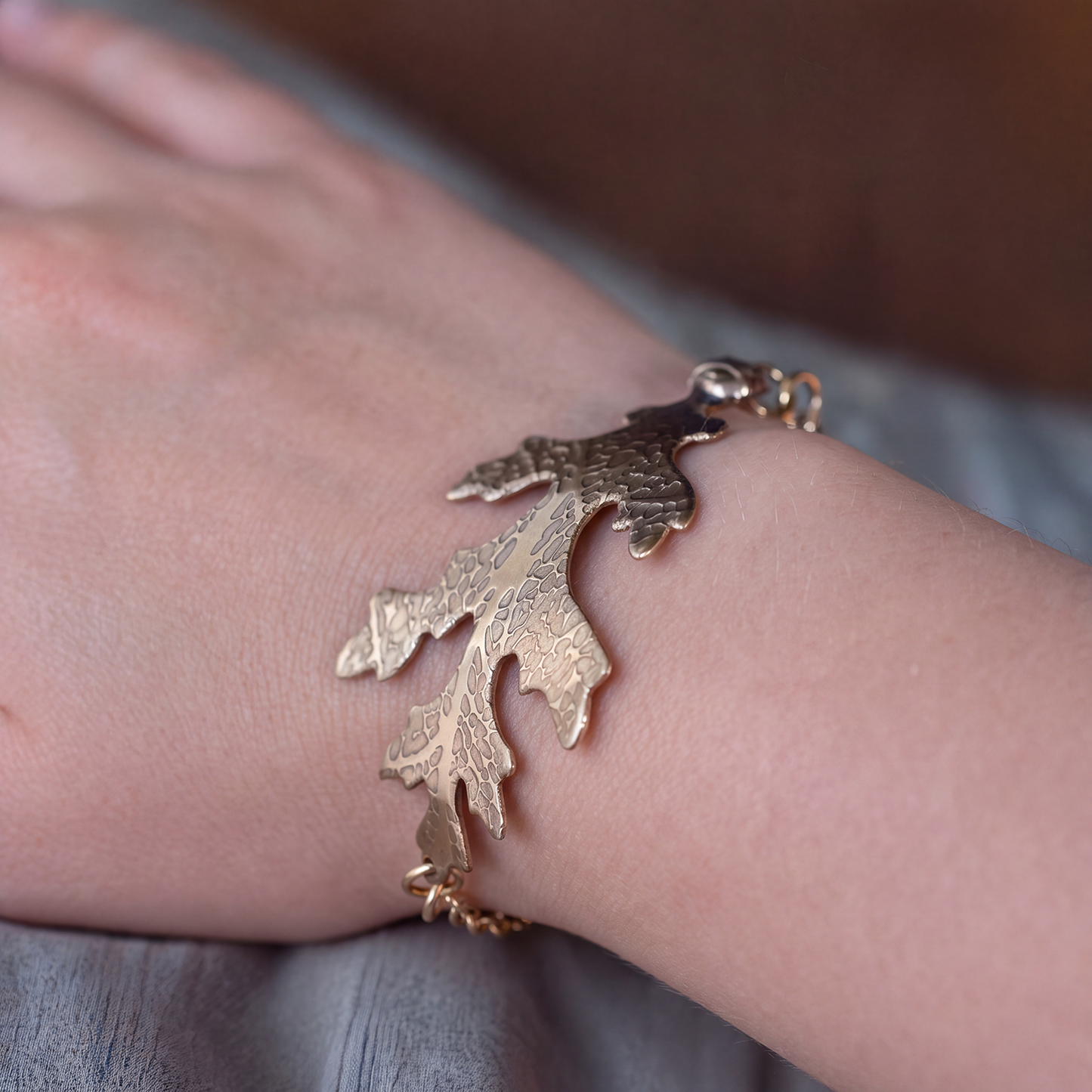 detail of the Oak Leaf Bracelet on a model