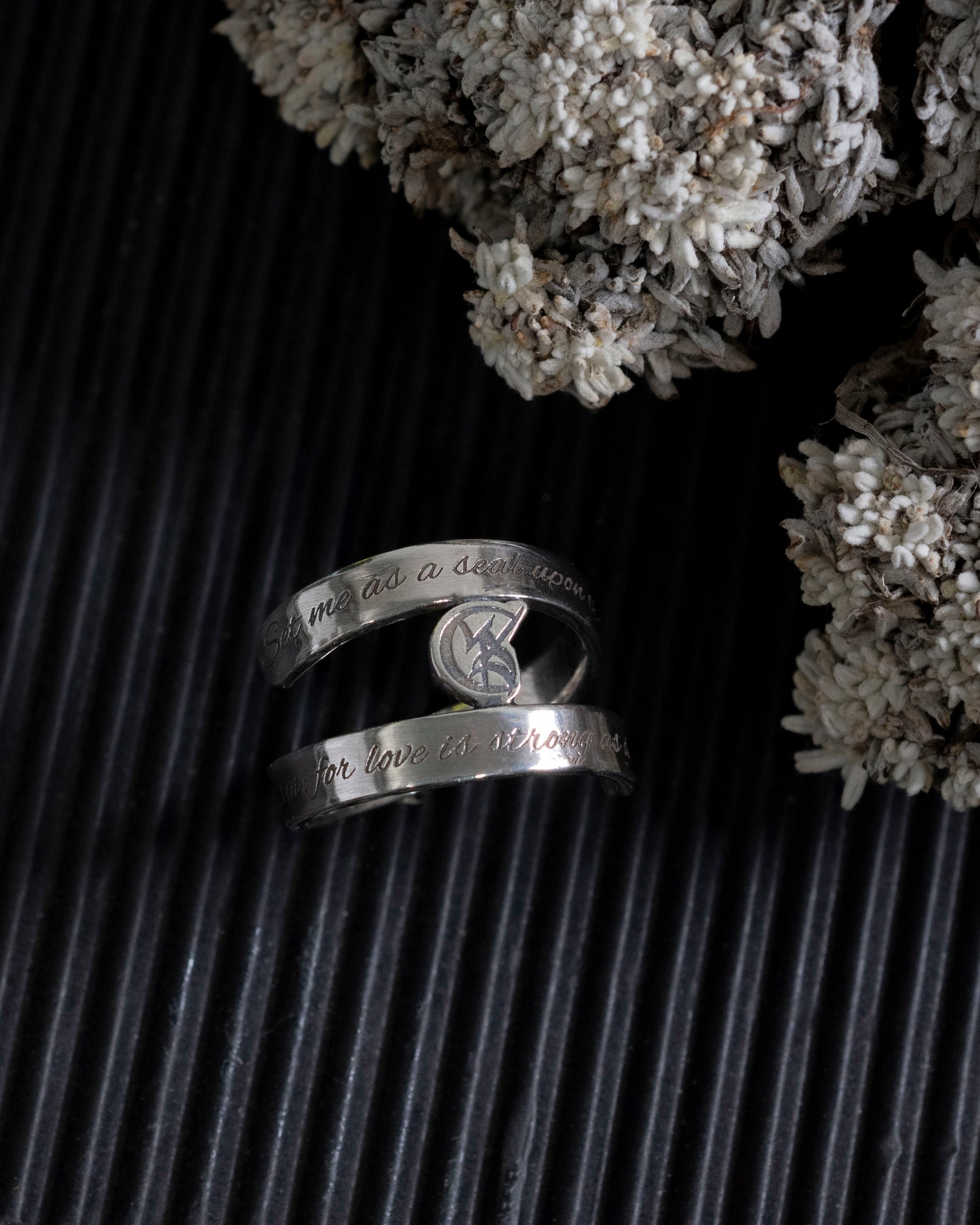 The Shadowhunters wedding vows inscription on the wrap of the ring.