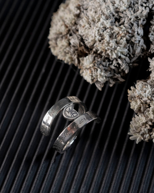 Close-up of the Wedded Union Rune on the silver ring.