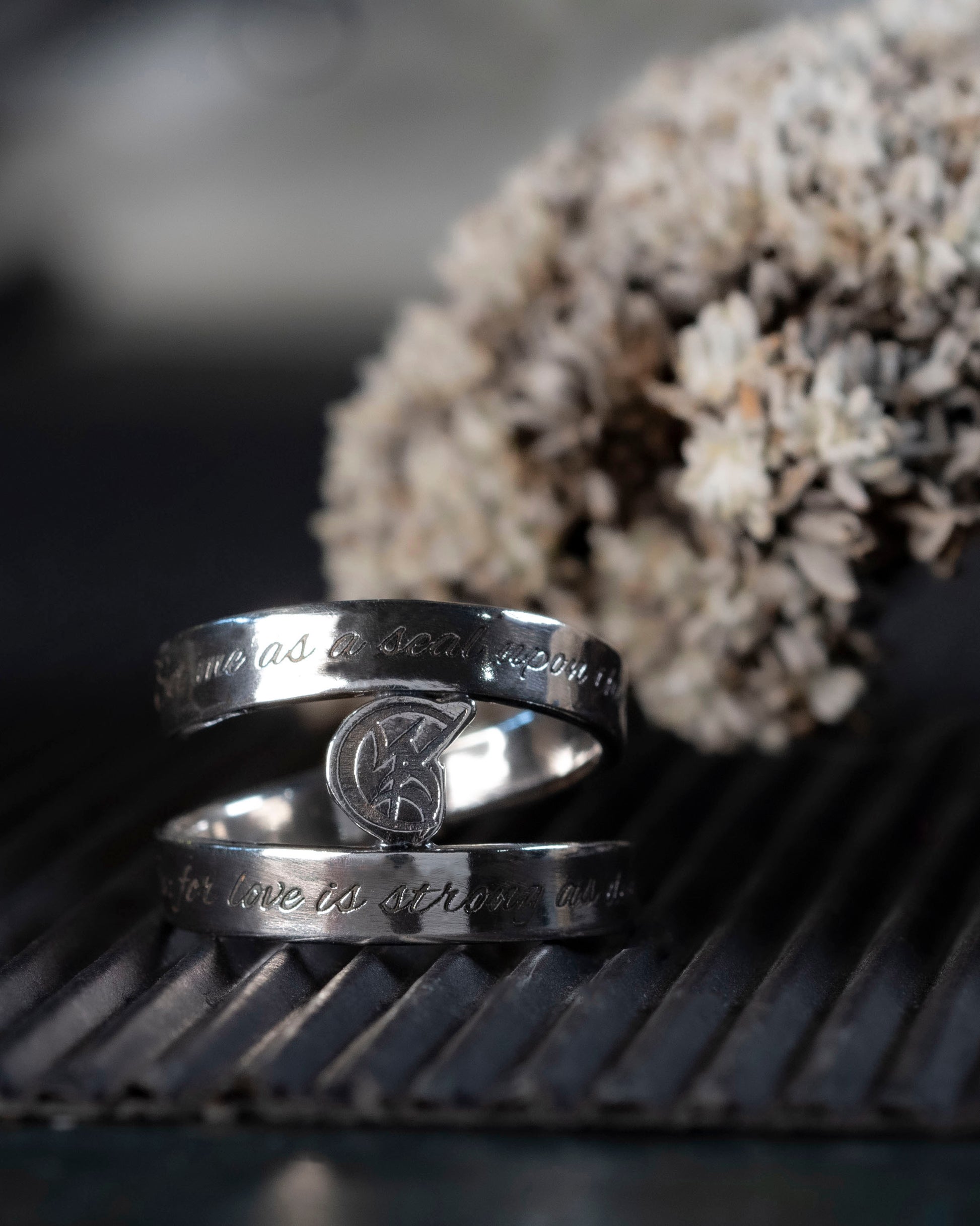 The Shadowhunters wedding vows inscription on the wrap of the ring.