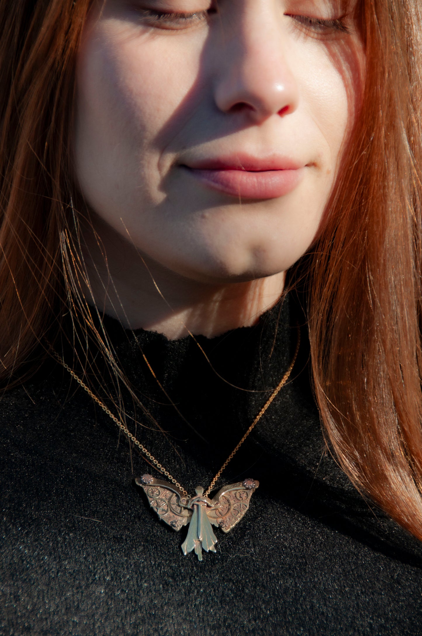 model wearing tessa's clockwork angel necklace