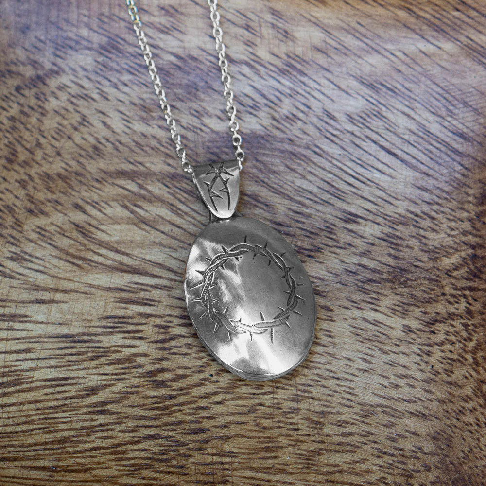 blacktorn silver locket and quote