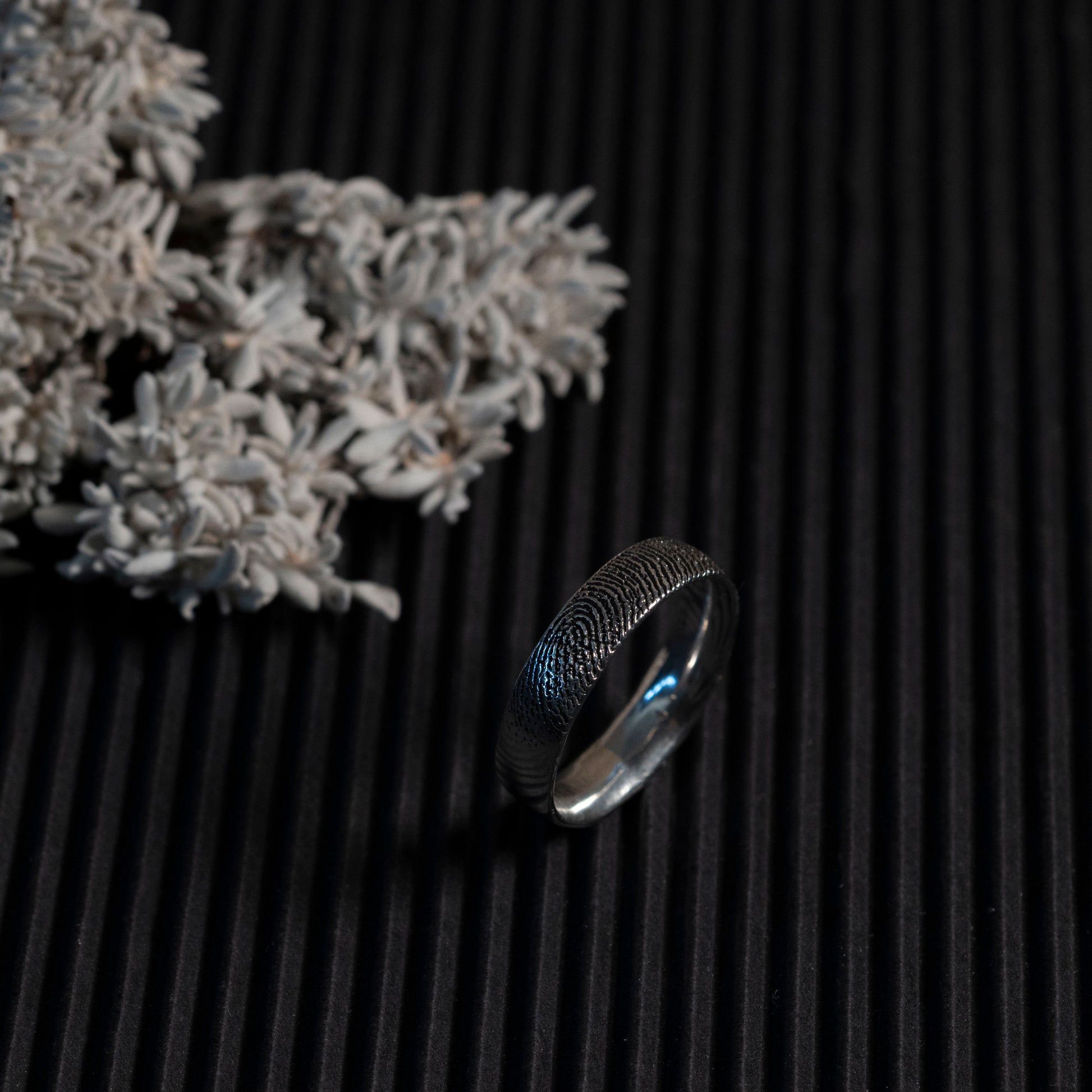 Detail of fingerprint on sterling silver ring