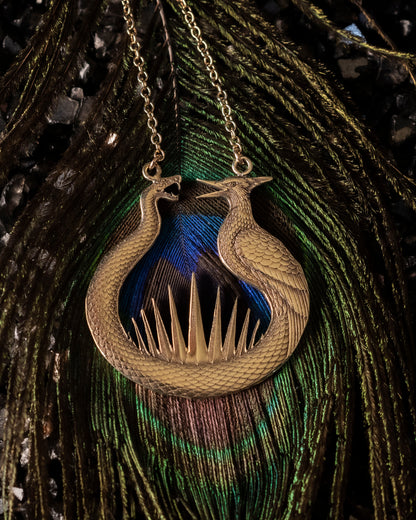 The Sunrise at the Reaping prequel book jewelry in brass.