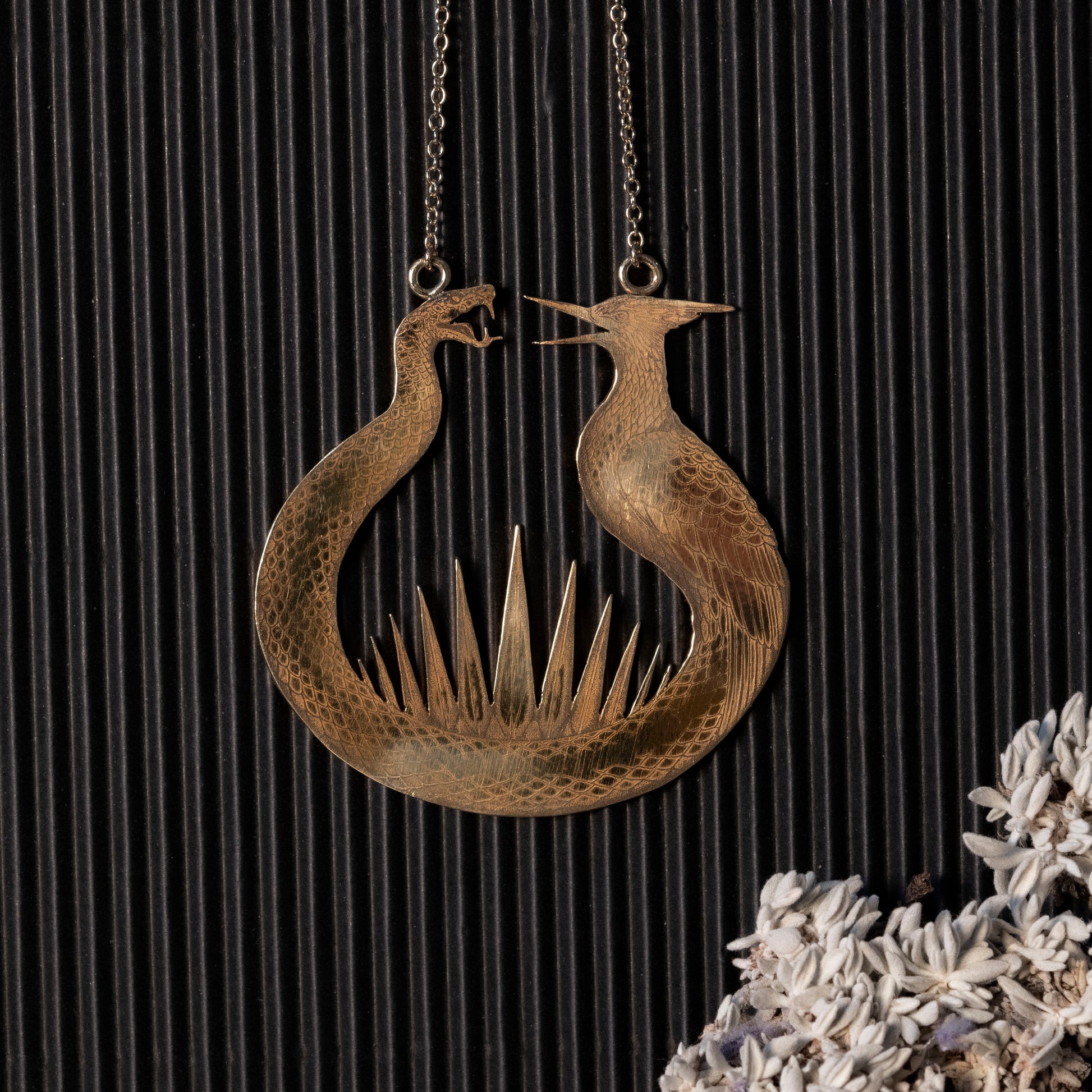 The Reaping the Sunrise inspired necklace on a gold plated chain