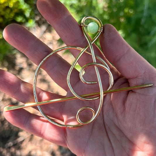 Brass hair fork with a jade bead shaped like Jem Carstairs' Cleft symbol for holding buns