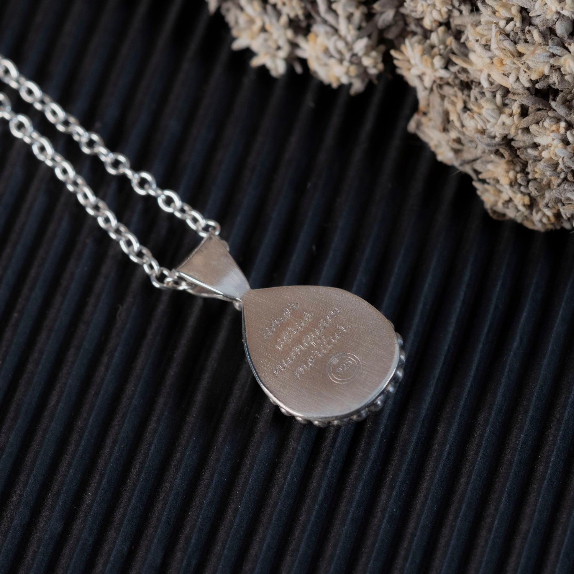 quote detail on the back of Isabelle's Ruby Necklace