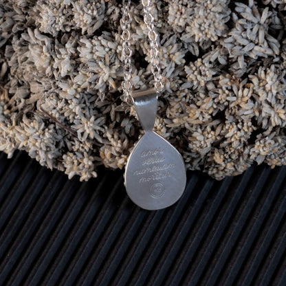 quote on the back of Isabelle's Ruby Necklace
