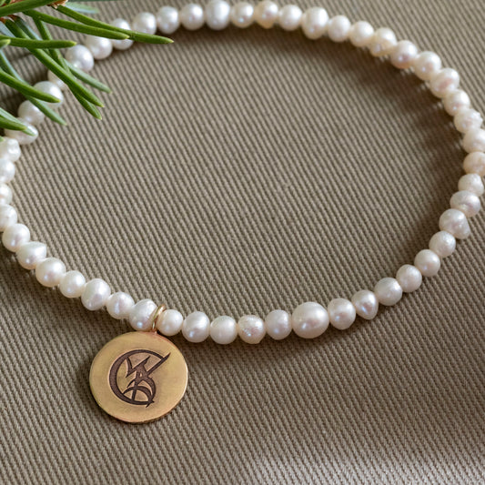 Tessa Gray Pearl Stretchy Bracelet with Brass Wedded Union Rune Medal