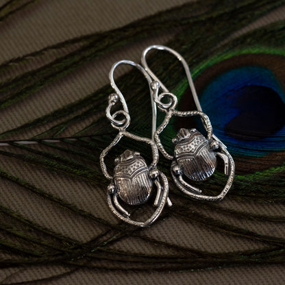 Sterling silver scarab earrings pressed from a 1900s vintage jewelry die, inspired by the Shadowhunters Last King of Faerie book cover