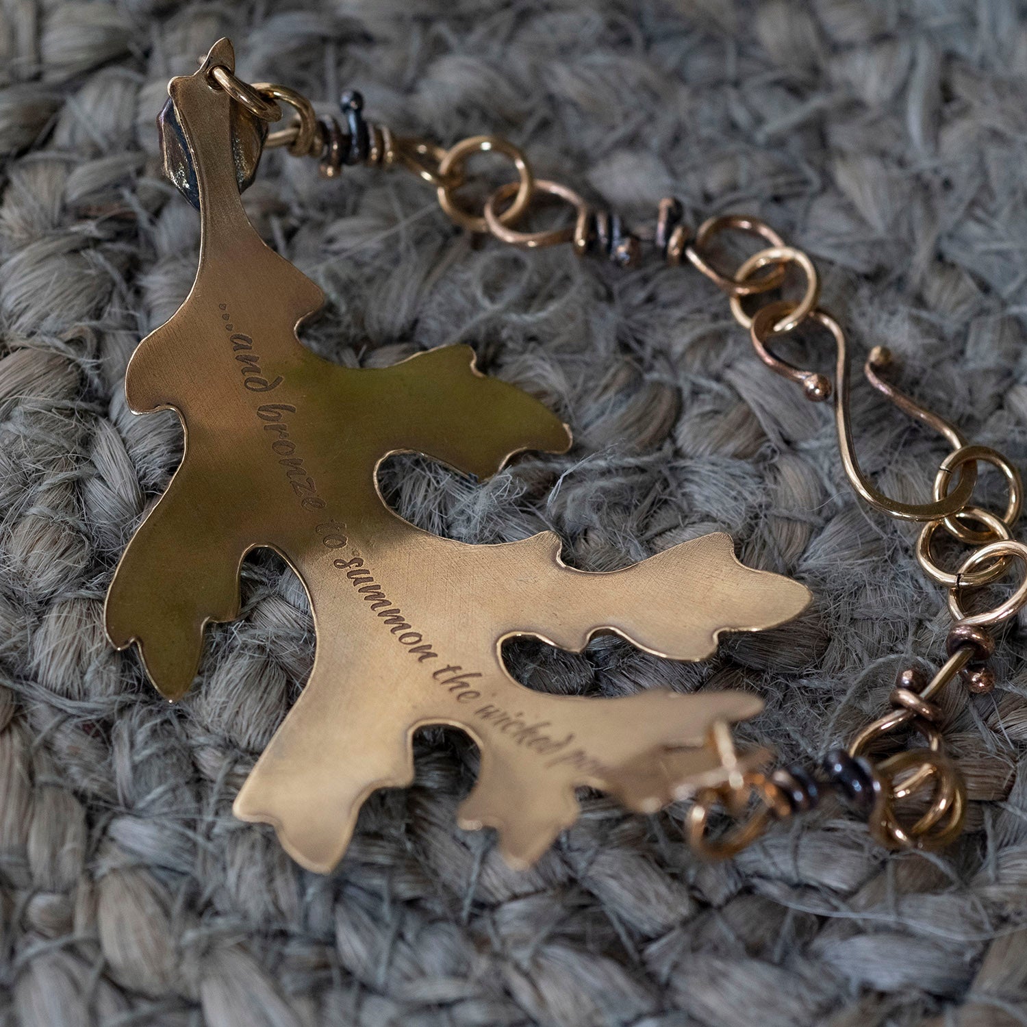 back quote detail of the Oak Leaf Bracelet inspired by the Last King of Faerie 