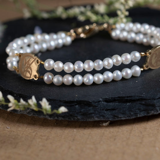Tessa's pearl bracelet inspired by The Infernal Devices, with smaller pearls and Wedded Union Runes