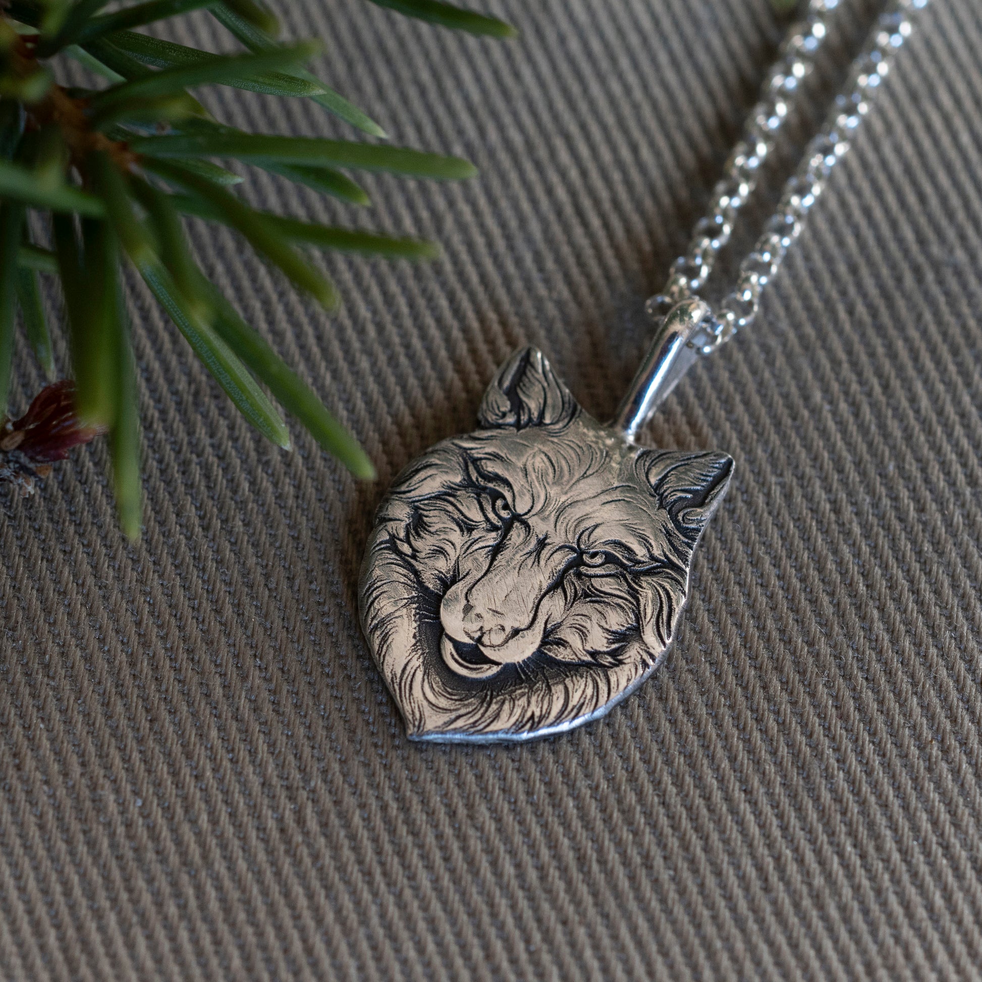 Small version of the Wolfe Family Shield pendant