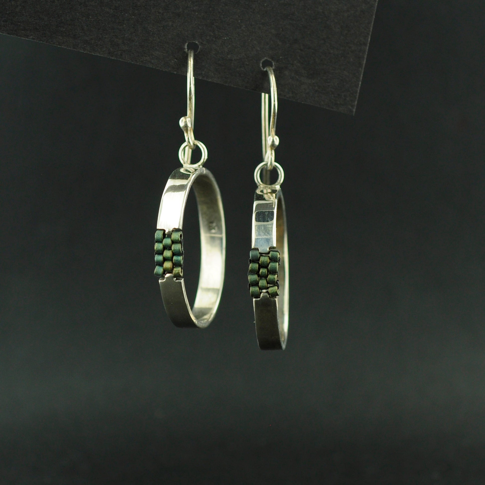 Sterling silver hoops with woven Miyuki beads.